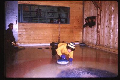 Photographs of boys curling