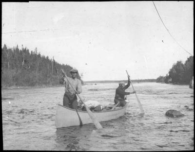 Photograph of two men in a canoe, Albany River