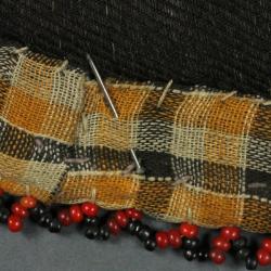 Beaded pouch with birds and floral pattern