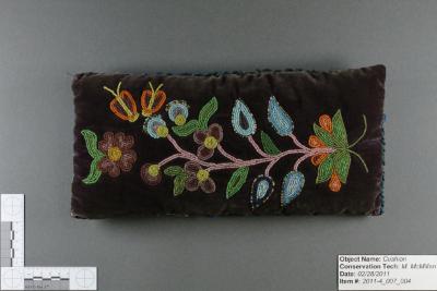 Floral beaded cushion