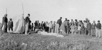 Photograph of of children arriving from Rupert's House being welcomed by the principal