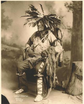 Photograph of a Cree man in regalia