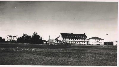 Photographs of buildings and people in Hobbema