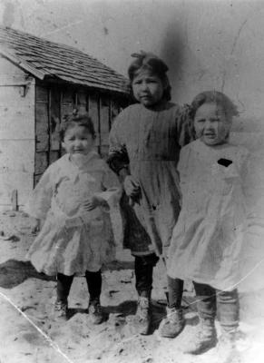 Photograph of three young girls outside