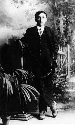 Photograph of a young man in a suit