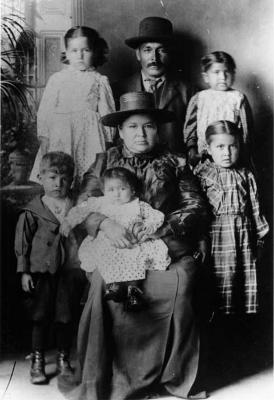Photograph of Israel Mukudebiness Beaudin, Mary Mekategaiashk and their children