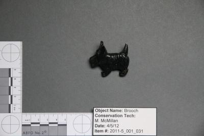 Black dog brooch