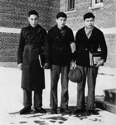 Photograph of three Shingwauk students
