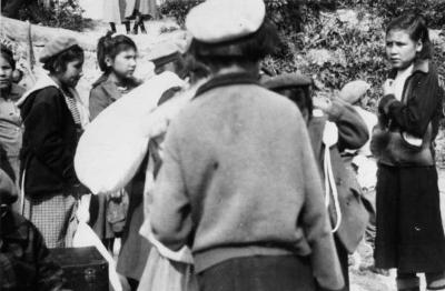 Photograph of students waiting for a plane home