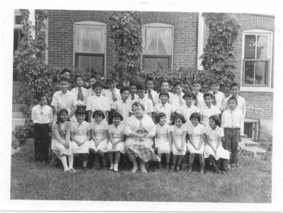 Photographs of students and staff outside at St. Mary's