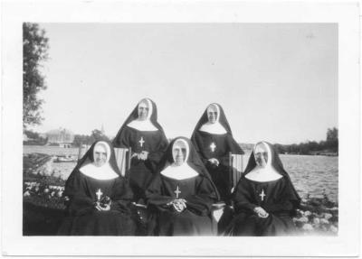 Photographs of students, staff, and buildings