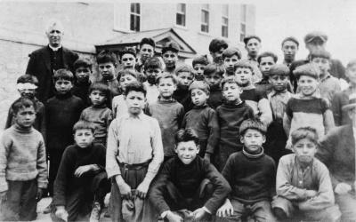 Photograph of a group of students with the minister