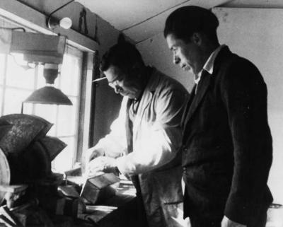 Photograph of men working in a woodworking shop