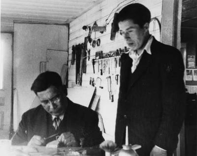 Photograph of men working in a woodworking shop
