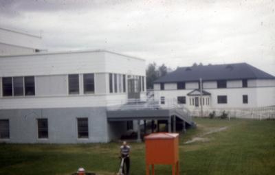 Photographs of buildings and people in Moose Factory