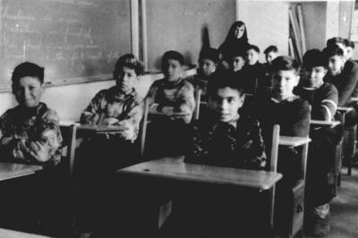 Photograph of boys in a classroom