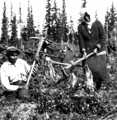 Photograph of students chopping wood