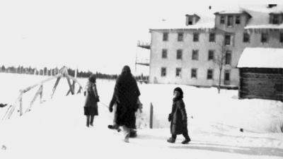 Photograph of people outside of St. Anne's Indian Residential School