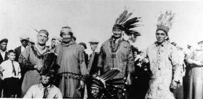 Photograph of Joe Jacko, Joemin Peltier and other men at a Wiky pow wow