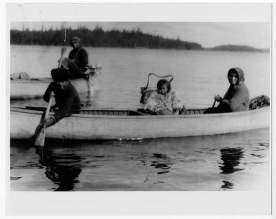 Photograph of children in a boat near Fort Albany