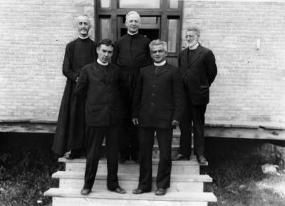Photograph of five priests in Cape Croker