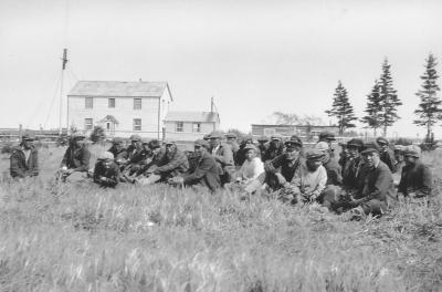 Photograph of villagers in summer