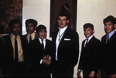 Photographs of Ramona Joseph and priest with students of Lejac residential school