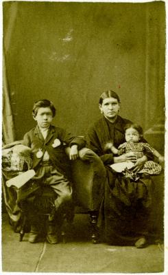 Large photo album page 44: Photograph of William with his aunt and cousin
